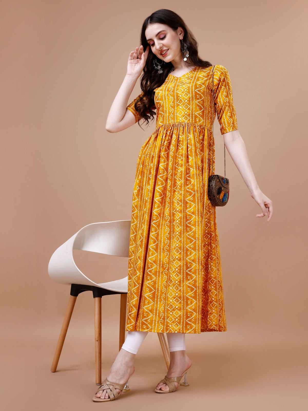 Stylish Bandhani Naira Cut Kurta with Latkan in Yellow Colour